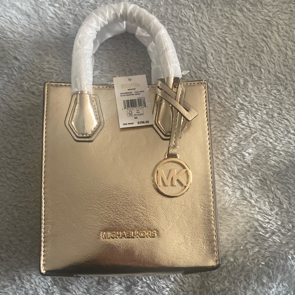 Michael Kobe’s pale gold crossbody bag